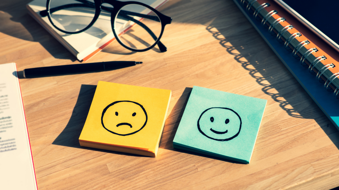 Smileys on post its display - Emotions a work